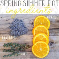 orange slices and lavender sprigs on a wooden table with the words spring summer pot ingredients