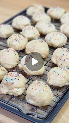 some cookies on a cooling rack with sprinkles