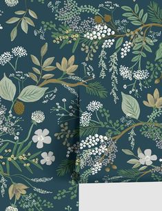 an image of a wallpaper with flowers and leaves on it's blue background