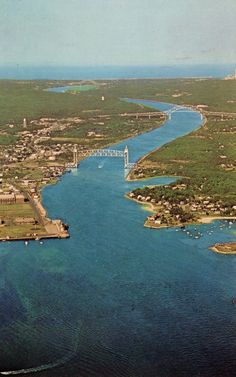 an aerial view of the water and land