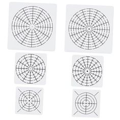 four circles that have been drawn on paper