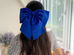 Big royal blue duchess satin with tails hair bow with barrette attachment.  They are handmade with love and care using high quality fabric.  The bow measures  24 cm or 9 1/2" in width appx  12 cm or 4 3/4" in height  Tail is 18 cm or 7" long  Attachment: Barrette (Available in other attachments. Please message me)  *Please be noted that the color might appear a little differently on each phone, tablet, or computer screen. Ponytail Scrunchie, Large Hair Bow, Giant Bow, Bow Choker, Large Hair Bows, Duchess Satin, Ciel Phantomhive, Handmade Hair Accessories, Big Party