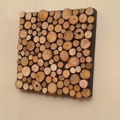 a piece of wood that has been cut into smaller pieces and placed on the wall