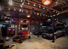 a garage filled with lots of different types of cars