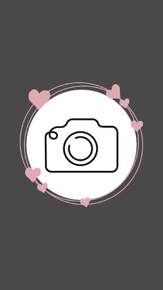 a camera with hearts around it