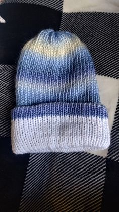 Supper cute blue and white beenie Reverable aswell!! 9/12 in  881/2 in  Cold wash Warm Blue Beanie Cap, Warm Blue Beanie Hat, Blue Warm Beanie One Size, Casual Blue Knitted Hat, Casual Blue Winter Bonnet, Warm Blue Beanie One Size, Warm Blue Cap, Blue Winter Hats One Size Fits All, Blue One-size Winter Hats