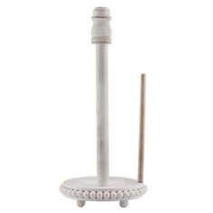 a white toilet brush and holder on a white background