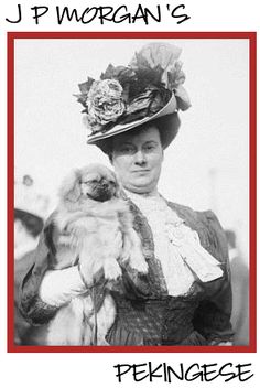 an old black and white photo of a woman holding a small dog in her arms