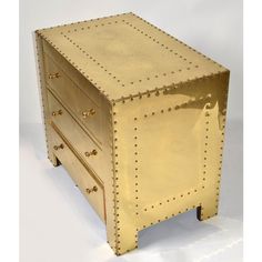 a gold metal box with rivets on the sides and drawers is shown in front of a white background