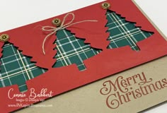 a christmas card with plaid trees on it