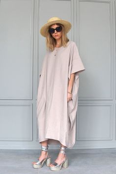 Be relaxed, free and safe in this oversized beige dress. Unique oversized tunic dress, made of viscose. Lightweight fabric very comfortable to wear on a hot day. Wear it even as a long tunic or dress. It's extremely versatile. The dress has short decorative sleeves. The dress has decorative belts on the side and hidden pockets in the side seam. The dress bottom is asymmetric. The dress is made of high-quality viscose and makes it a perfect casual wear. DIDRESS is part of the slow fashion movemen Summer Dress Plus Size, Oversized Tunic Dress, Maternity Long Dress, Plus Size Costume, Cocoon Dress, Loose Tunic, Red Evening Dress, Oversized Tunic, Beige Dresses