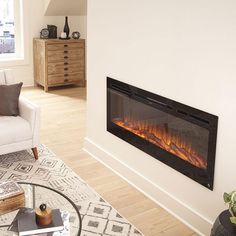 a living room with a couch, chair and fire place in the fireplace that is built into the wall