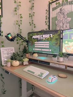 two computer monitors sitting on top of a desk