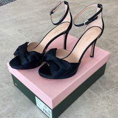 Nwt Kate Spade Bridal Bow Heels. Black Satin, Size 9.5. Buckle Closure At Ankle Strap. Topped With A Feminine Twisted Bow. 100% Kid Leather Lining. 4” Platform Heel. 1/2” Platform. Brand New In Box With Dust Bag. Pretty Heels Black, Bow Heels Black, Gold Pumps Heels, Prom Shoes Black, Black Heels With Bow, Open Toe Sandals Heels, Black Wedding Shoes, Bridal Bow, Kate Spade Heels