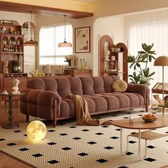 a living room filled with furniture and decor