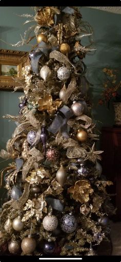 a decorated christmas tree with ornaments on it