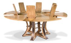 a wooden table with six chairs around it and one chair on the other side, in front of a white background