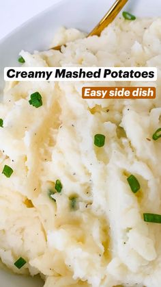 creamy mashed potatoes with green onions in a white bowl