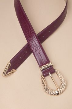 Say ""howdy"" to the endless array of iconic ways to style the Petit Moments Modern Rodeo Burgundy Western Belt! This cute belt is ready to giddy-up with its faux leather construction that shapes a Western-inspired silhouette with a shiny, oversized gold buckle with a twisted design and a matching tip. Pair to perfection with all of your favorite blue denim! Size XS/S Measures 1. 25" Wide. Belt Adjusts Between 28" And 34" With 7 Hole Adjustments. Size M/L Measures 1. 25" Wide. Belt Adjusts Betwe Brown Leather Belt For Rodeo, Cute Belts, Luxury Brown Belt For Rodeo, Burgondi Waist Belt, Western Brown Embroidered Belt, 2.5” Western Belt For Women, Cold Outfits, Western Belts, Wide Belt