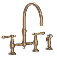 two faucets are shown with the handles on each side and one is gold