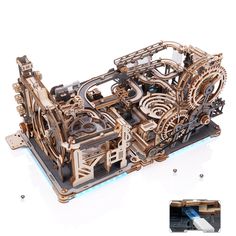 an intricate wooden model of a machine