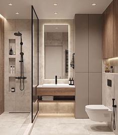 a bathroom with a toilet, sink and shower in the middle of it is illuminated by recessed lighting