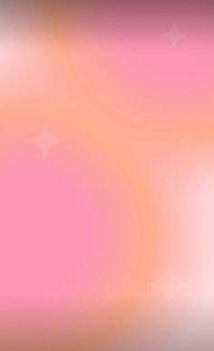 an orange and pink blurry background with stars