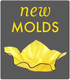 a yellow flower with the words new molds on it's back side, in front of a gray background