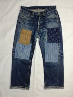 Sugarcane Lot 1947 Selvedge Jeans Made in Japan by Toyo Enterprise Custom with handstiched sashiko patchwork One of a kind! Crotch repaired (refer all images) ACTUAL MEASUREMENT (Inch) Waist 32 Outseam 38.5 Inseam 28 Leg Opening 17 Rise 11.5 Thigh 12 CN136 NOTE 1) All items are 100% authentic. 2) All items should be WASHED before use. 3) Do not rely on tag size as pre-worn items may have been altered, stretched or shrunk. 4) The best way to ensure a correct fit is to compare our measurements with the measurements of a similar item that you know fits you well. 5) Please refer all images, and enlarge them for better details. 6) All measurements are been taken with the garment flat on the floor. 7) NO RETURN NO REFUND AFTER PURCHASE. 8) Please do not expect it to be like new as mostly are use Indigo Patchwork Cotton Jeans, Sashiko Art, Sashiko Jeans, Sashiko Patchwork, Denim Repair, Torn Jeans, Black Jeans Outfit, Love Jeans, Patched Jeans