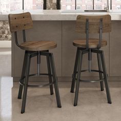 two wooden stools in front of a kitchen counter