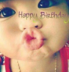 a close up of a baby making a face with the words happy birthday written on it