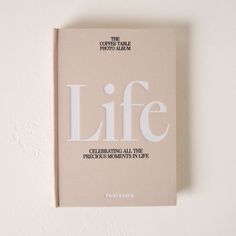 a book with the title life written in white on it's front and back cover