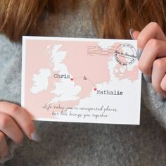 a person holding up a card with a map on it and the words, ohir & nathanie