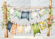 a watercolor painting of clothes hanging on a clothes line with flowers and leaves around it