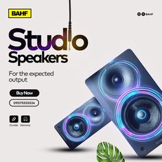 an advertisement for a speaker system with blue and purple lights on the front, and green leaves in the back