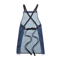 a denim apron with black straps