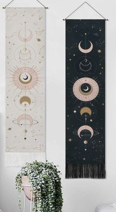 two wall hangings with different designs and shapes on each one, the third has an eye