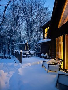 the outside of a house covered in snow