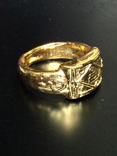 This is a perfect and unique style magic sacred ring made of metal gold plated by LP Kuay from Kositaram Temple. The power of the ring is to protect all dangers including ghost, evils and devils and the ring can bring good luck, fortune to the wearer. The ring showcases an elegant design with unique holy amulet. It is great to get this ring for your loved one or treat yourself for a classic timeless style. Amulet Name: LP Kuay Ring (1th Generation) Ring details: The ring engrave the Mantra of LP Symbolic Bronze Ceremonial Jewelry, Symbolic Bronze Jewelry For Ceremonial Occasions, Ceremonial Symbolic Bronze Jewelry, Symbolic Bronze Metal Ring Jewelry, Symbolic Bronze Jewelry With Metal Ring, Gold Spiritual Metal Ring Jewelry, Gold Spiritual Jewelry, Antique Gold Spiritual Jewelry For Rituals, Spiritual Gold Metal Rings