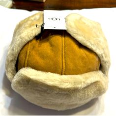 Ugg Sheepskin Trapper Hat In Chestnut Color Size Small/Medium This Hat Is Unisex For Male/ Female Man Hats, Ugg Earmuffs, Chestnut Uggs, Pink Uggs, Ugg Accessories, Trapper Hat, Chestnut Color, Trapper Hats, Mens Uggs