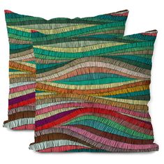 two decorative pillows with colorful lines on them