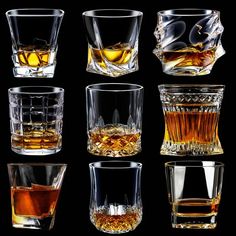 six different types of whiskey glasses on a black background