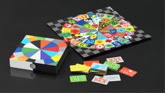 an assortment of colorful stickers on a black surface