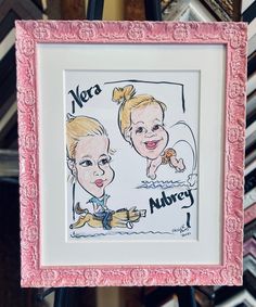 a drawing of two children in pink frames with the words nera and murray on them