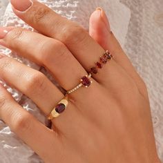 Discover this extraordinary Majestic Garnet Ring for its magnificent design and it will be the ultimate symbol of love and friendship in your life. It is perfect gift for your best friend. - Made in 14k solid gold- Decorated with handset lab grown garnet stone on 14k solid gold- Band Width: 1.32 mm / 0.051 inches- Top Width: 5.75 mm / 0.226 inches - Thickness: 1.38 mm / 0.054 inches- This product comes with iconic Norm Jewels gift box Engagements Ring, Garnet Ring Gold, Layering Diamond Necklaces, Silver Diamond Ring, Garnet And Gold, Garnet Jewelry, Red Gemstones, Garnet Ring, Garnet Rings