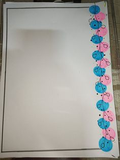 a sheet of paper with pink and blue hearts on it