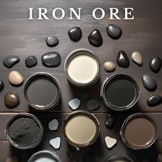 the cover of iron ore is shown with many different shades of paint and rocks on it