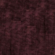 an image of a dark red background that looks like it has been dyed into something