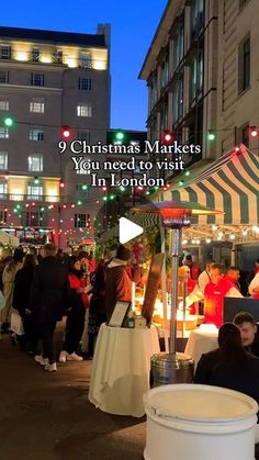 an outdoor market with lots of people standing around it and the words 9 christmas markets you need to visit in london