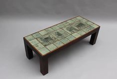 a coffee table made out of ceramic tiles